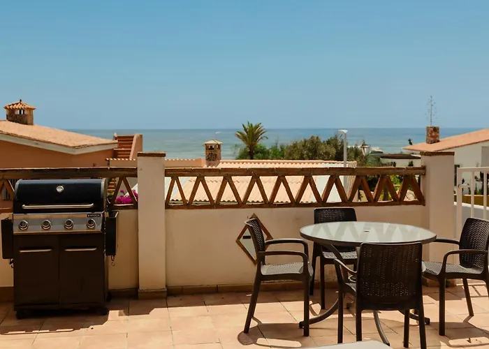 Beachfront With Private Terrace, Garden, Bbq, And Garage In Marbella